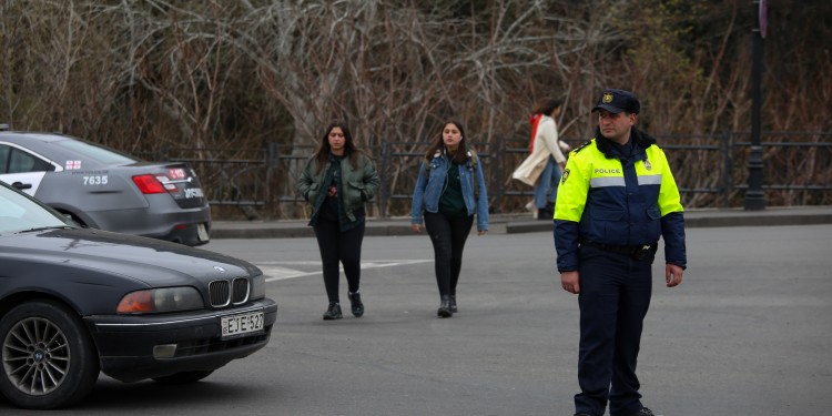 A member of Georgia's reformed Politsiya directing traffic in Tbilisi.